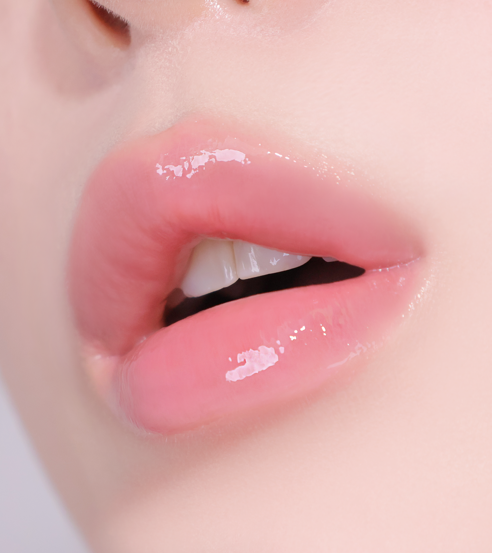 Swirl of HUEMI Melting Glaze Lip Gloss 01 Rosy Nude texture
