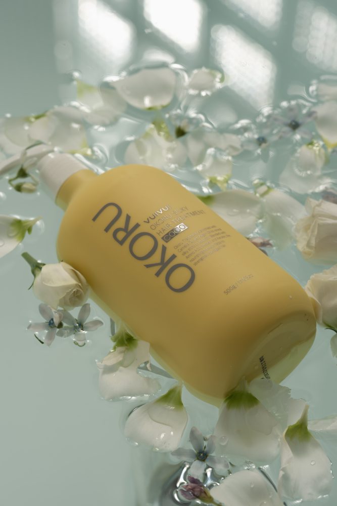 OKORU Coco hair balm applied to damp hair