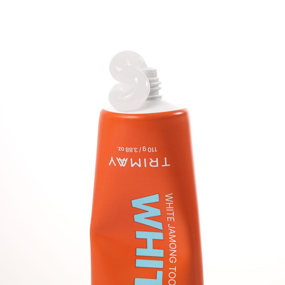 Close-up of Trimay Whitening White Jamong Tooth Paste tube showing product details